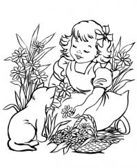 Девочка с кошкой на клумбе с корзинкой цветов 